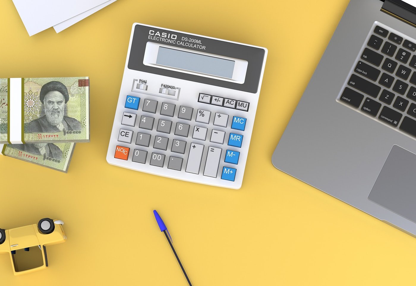 Freelancer planning service packages, pricing, and margin on a desk with notes and a laptop.